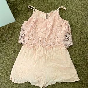 Lace overlay romper in blush
